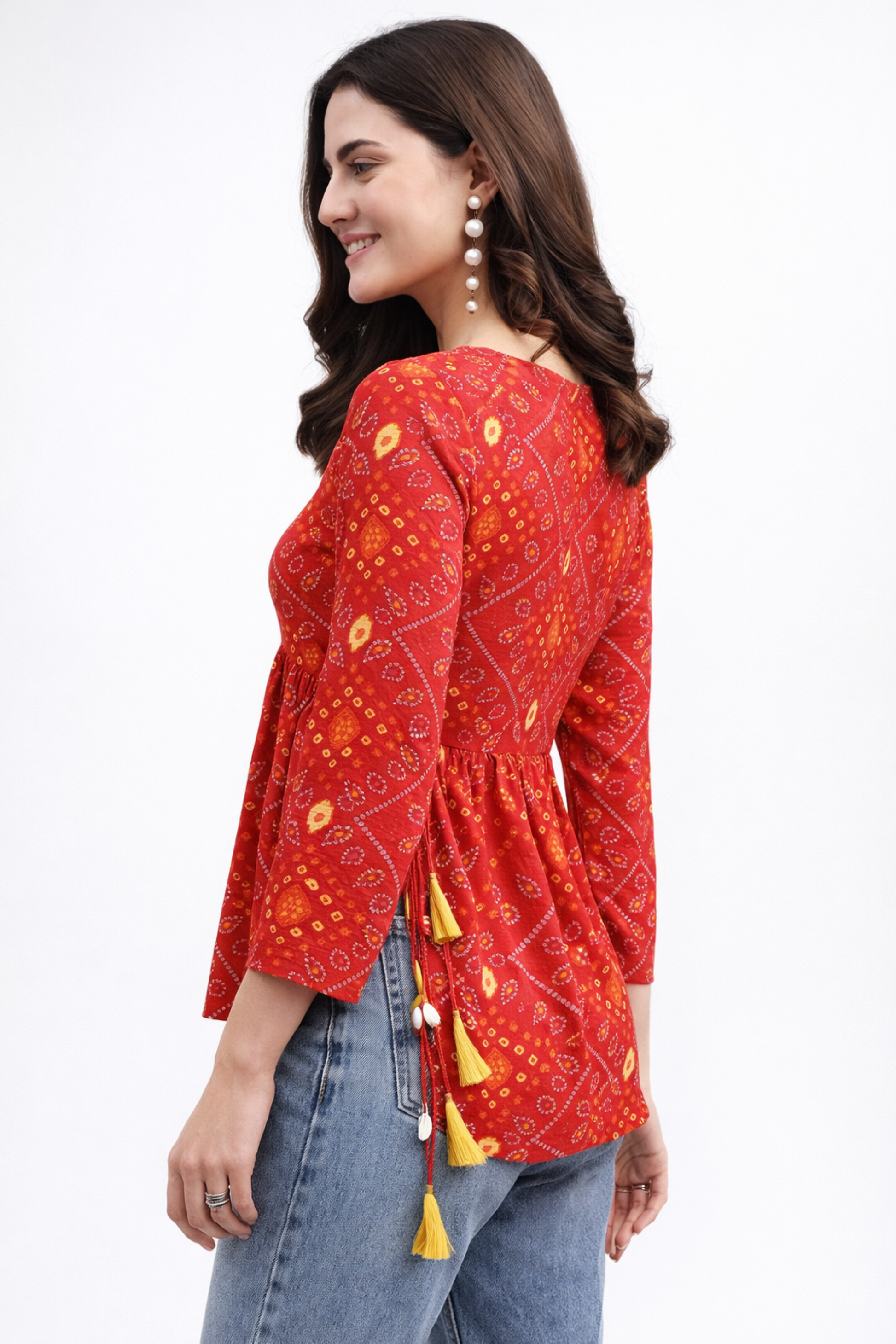 side view of red a-line kurti showing flow and structure