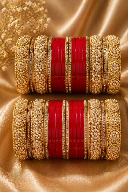 red and gold bridal bangle set with detailed outer layers