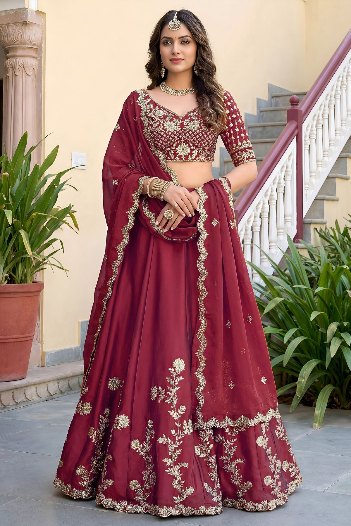 Red designer lehenga front view with embroidered choli and dupatta
