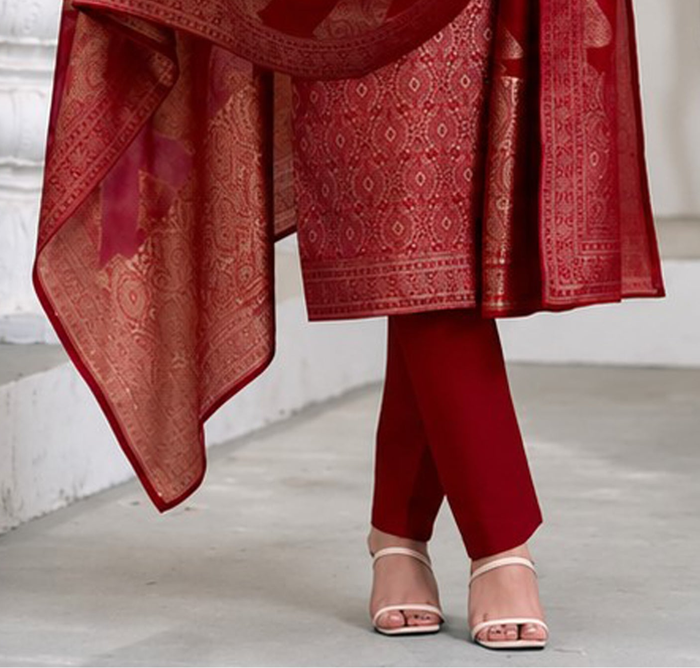 Full length view of red kameez pant suit with matching dupatta