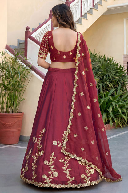 Red lehenga back side view with embroidered choli
