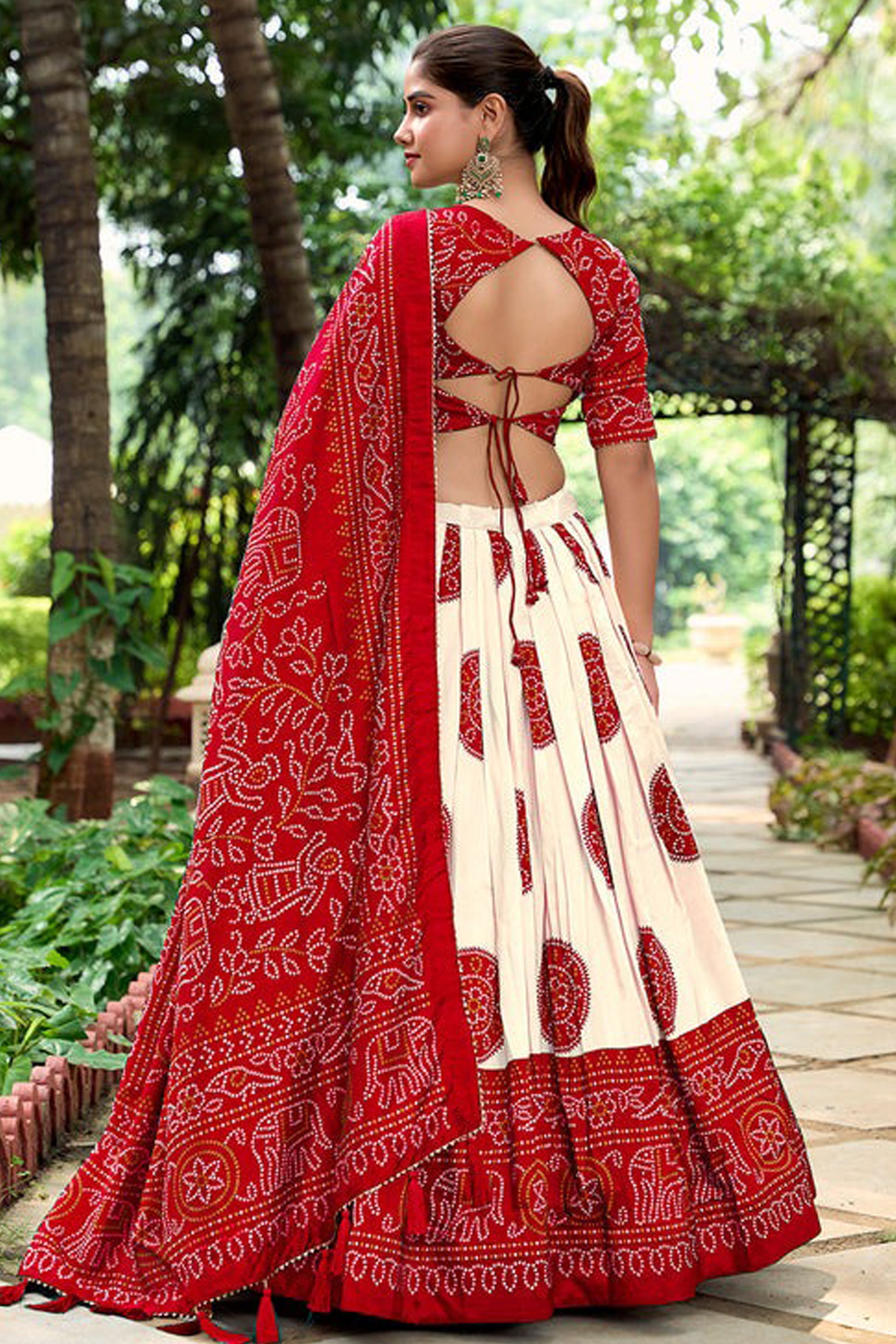 Back view of lehenga choli in red with soft silk texture