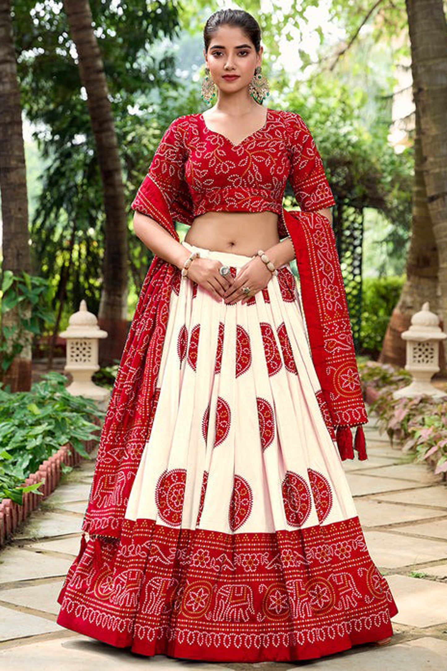 Red lehenga front view with Bandheji printed detailing