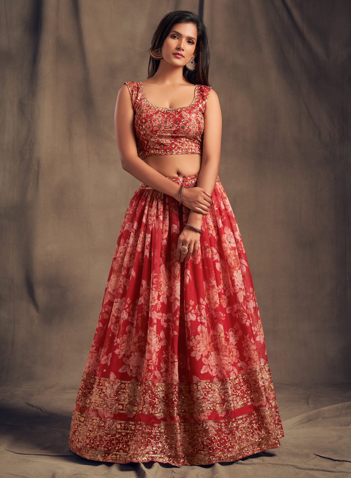red lehenga choli styled for wedding reception
