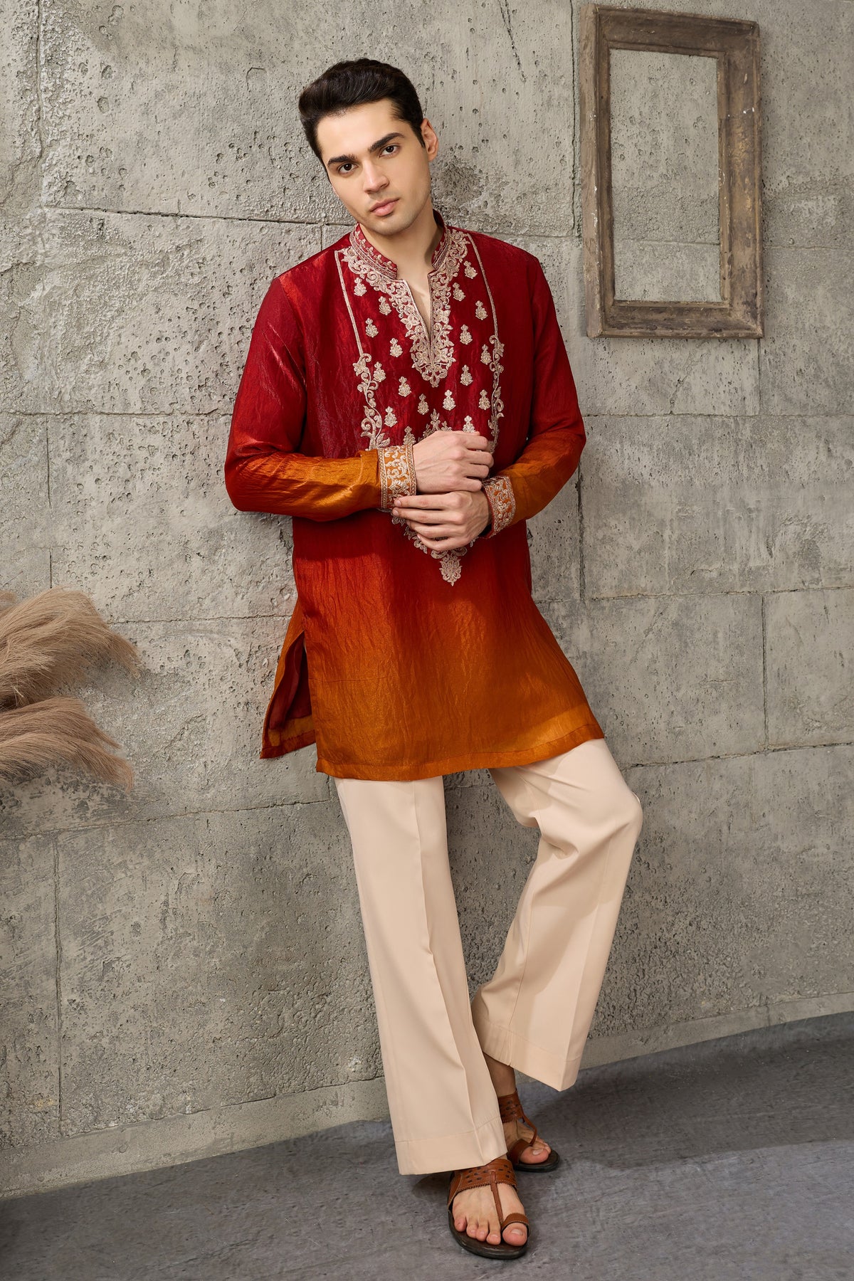 Red kurta hem and embroidery detail