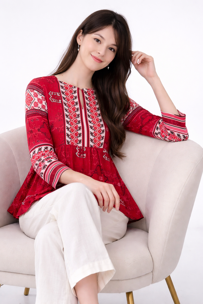 red top women styled for office outfit with trousers