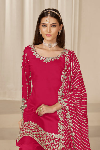 Close-up of embroidery on red Roman silk top