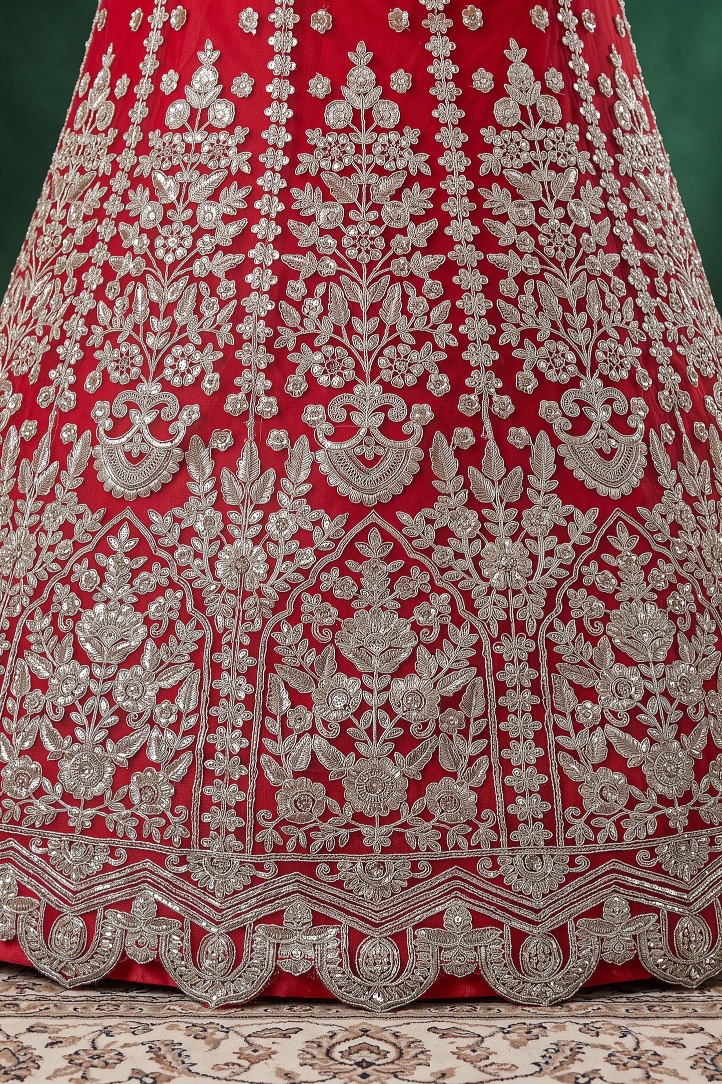 Red lehenga with multiple sequin embroidery work