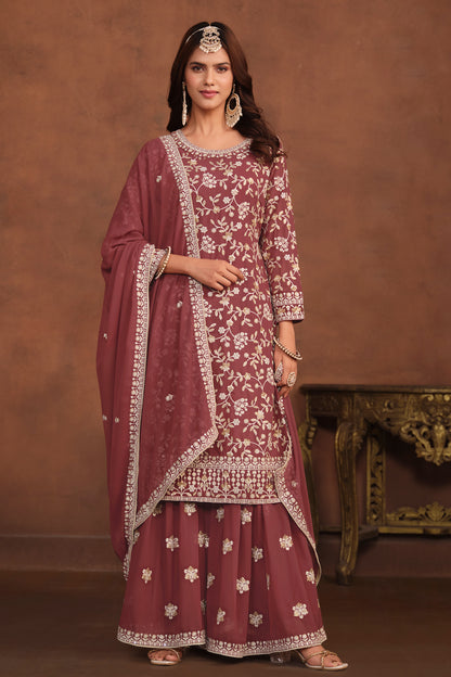 Front view of rose gold designer palazzo dress with embroidery