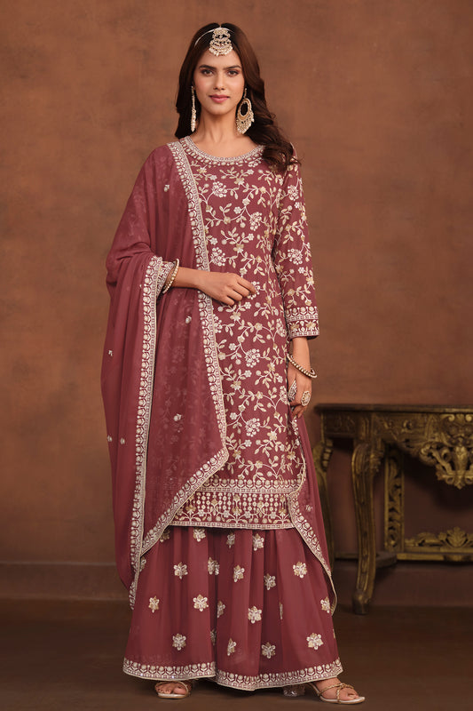 Front view of rose gold designer palazzo dress with embroidery