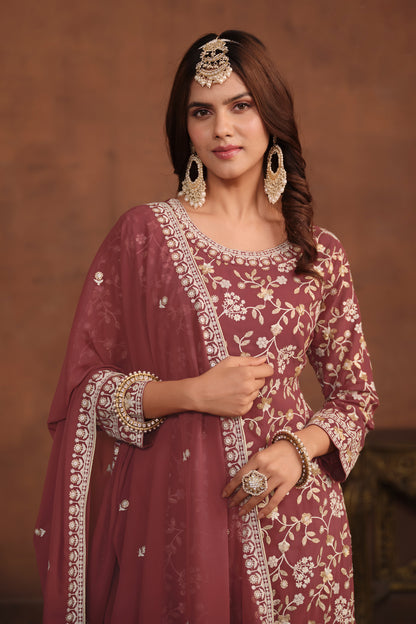 Side view of palazzo dress showing sleeve and embroidery details