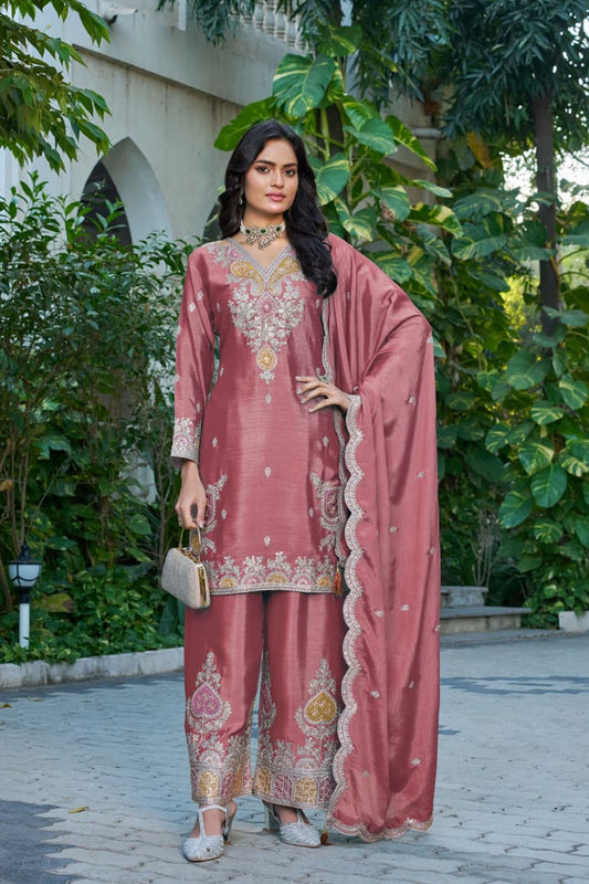 Woman wearing Rose gold Palazzo Suit with full back detailing