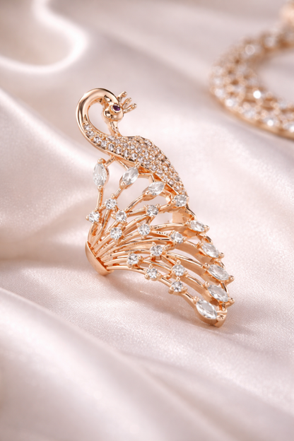 rose gold peacock statement ring with crystals
