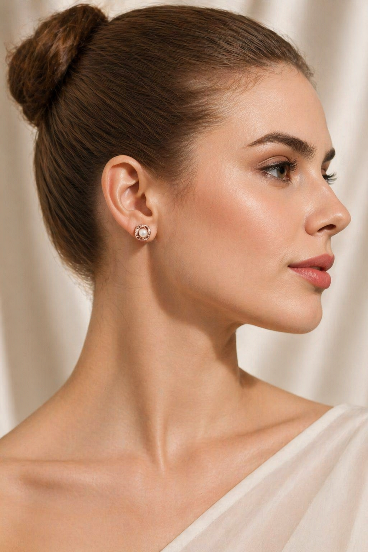 elegant pearl earrings set with zircon details