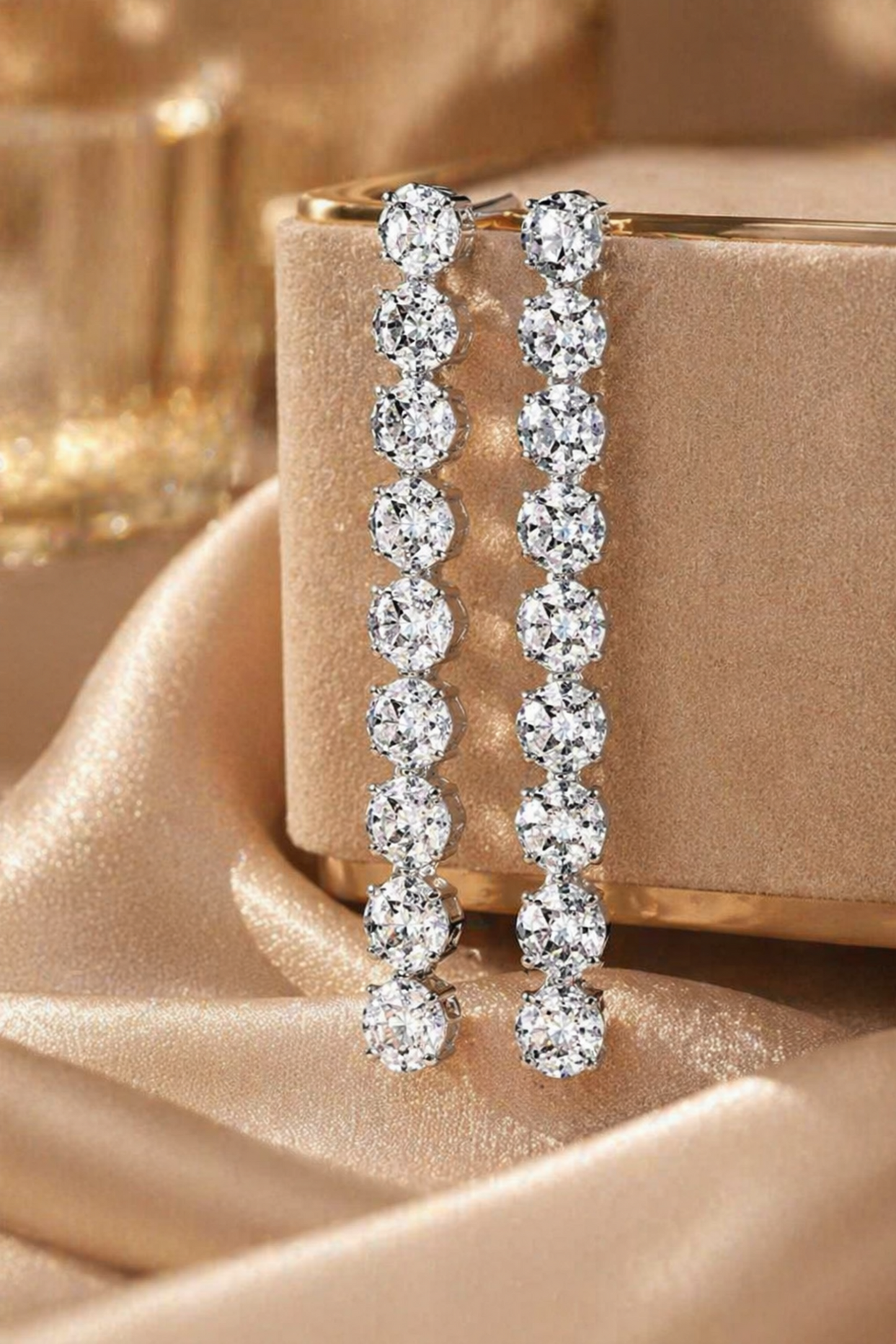 long diamond drop earrings in white gold