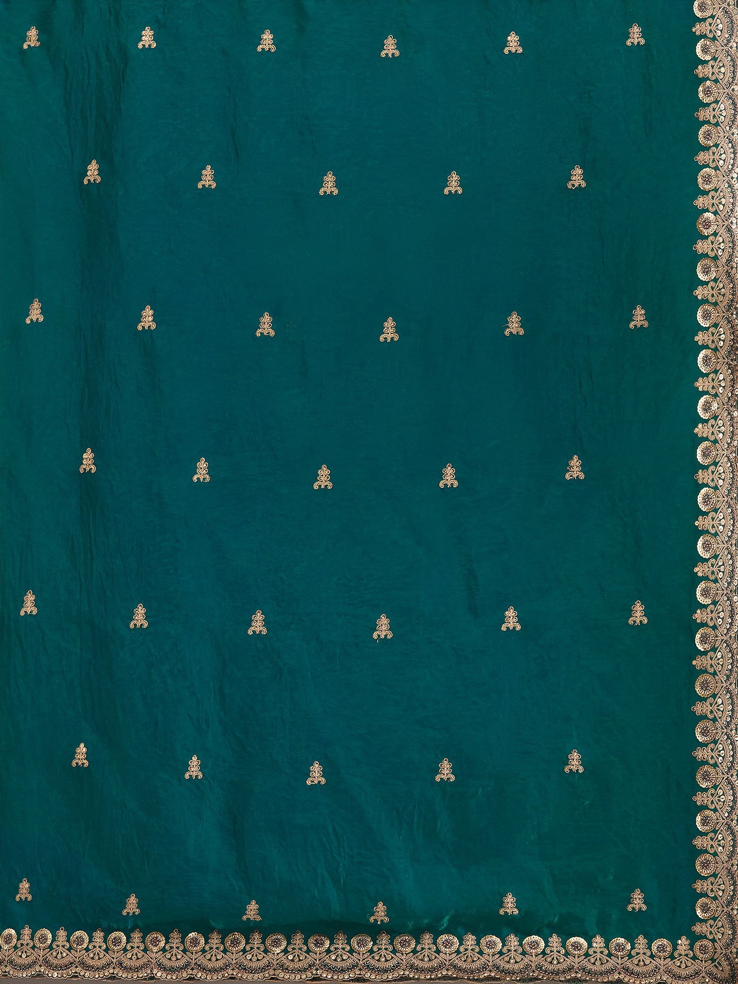 Fancy saree in royal green with heavy zari accents