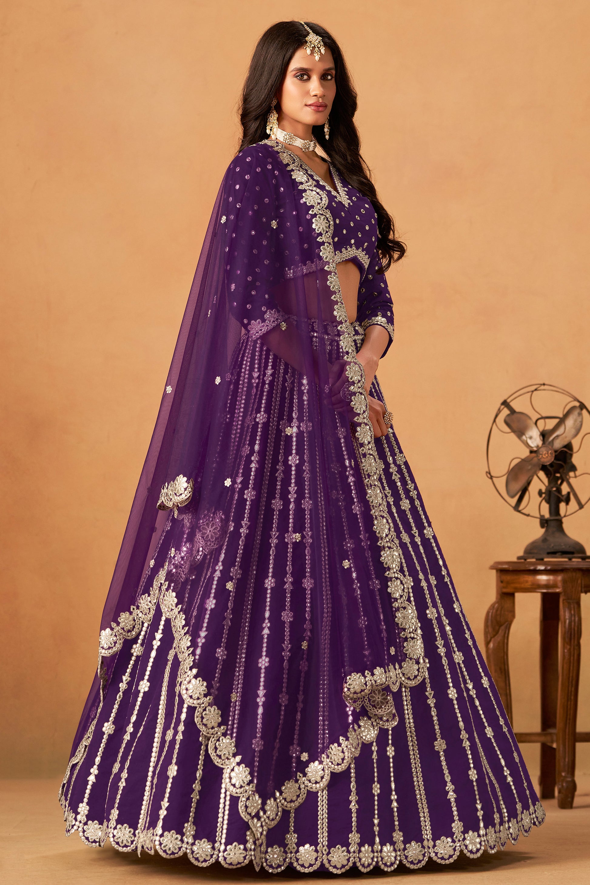Front view of royal purple embroidered lehenga choli set