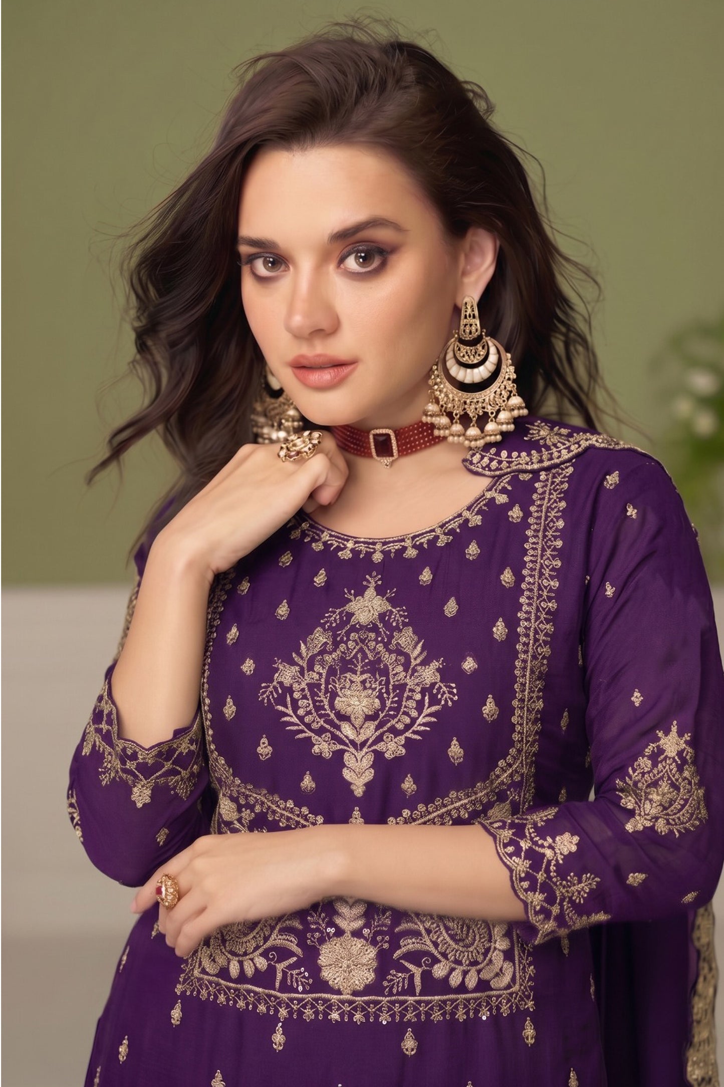 Close view of silk salwar kameez with embroidered thread sequin detailing