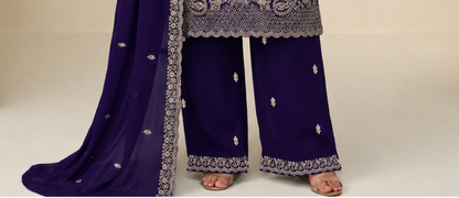 Party wear ladies suit in royal purple tone