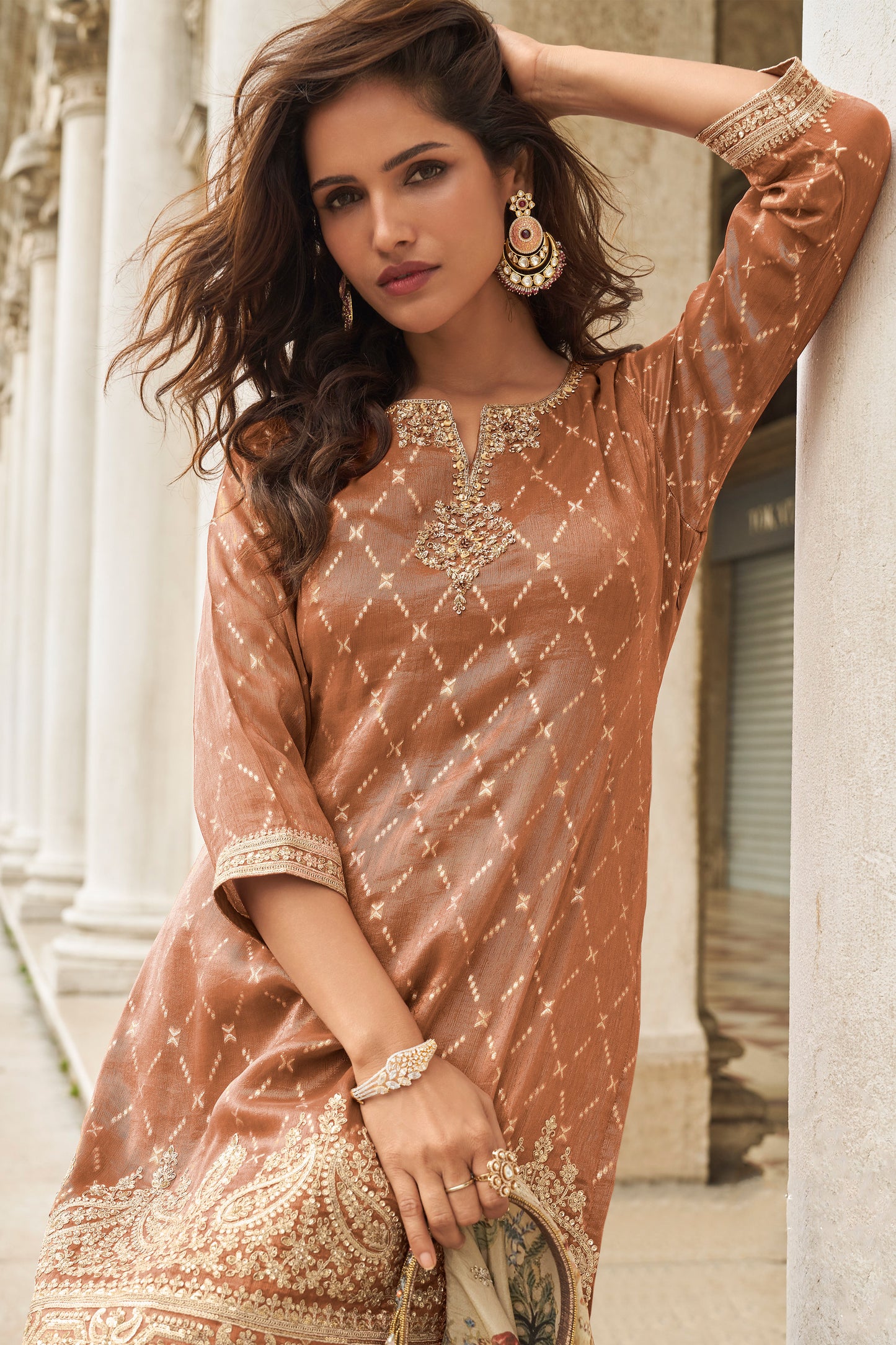 Flow of sharara pants in rust brown suit set
