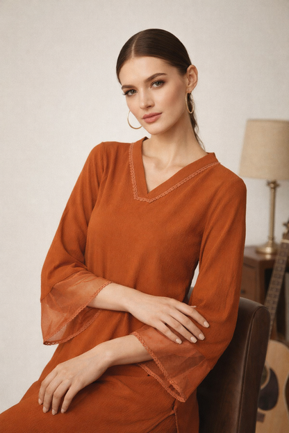 close-up neckline detail of orange women kurta