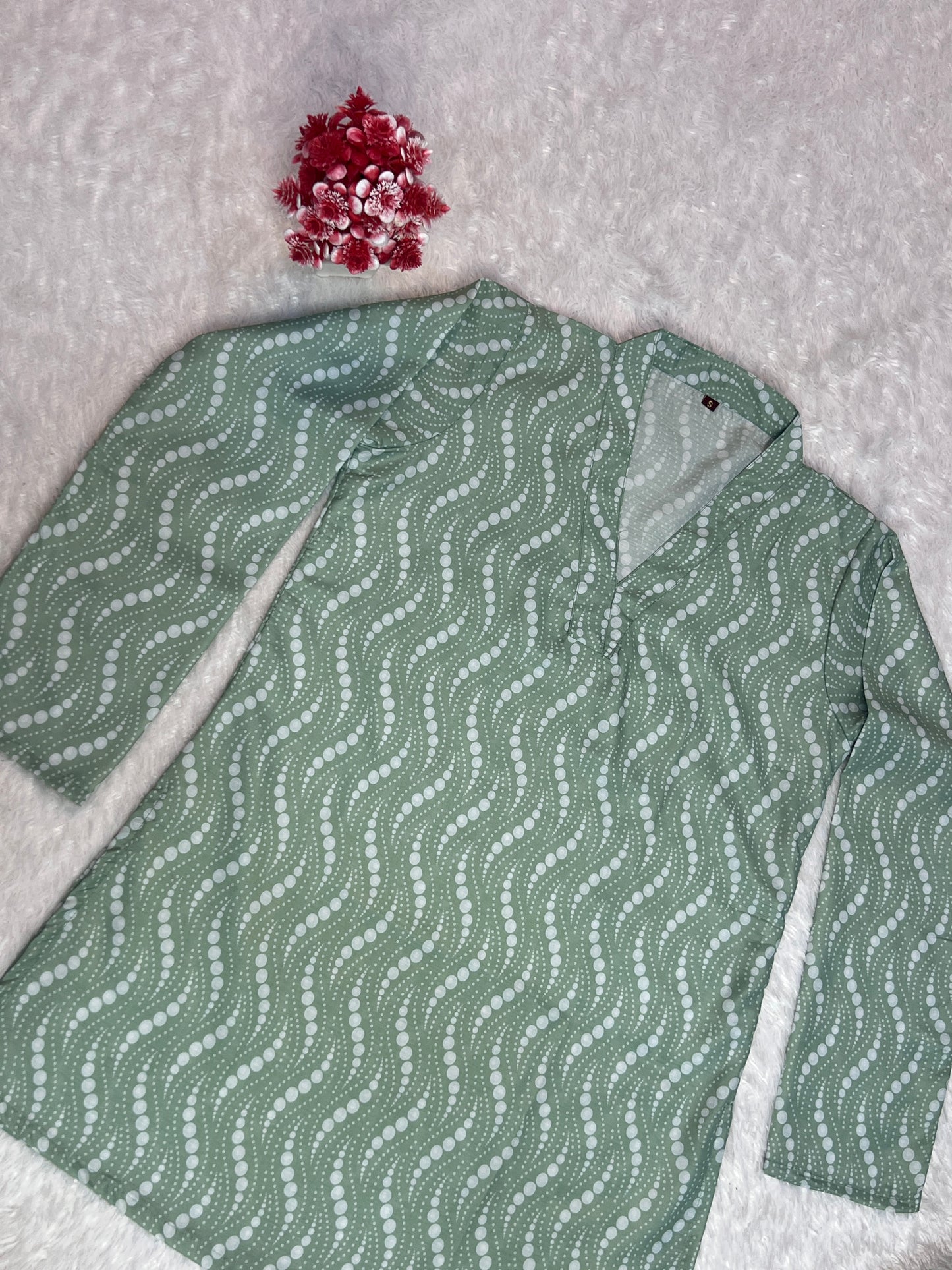 everyday wear women Tunic laid on neutral background