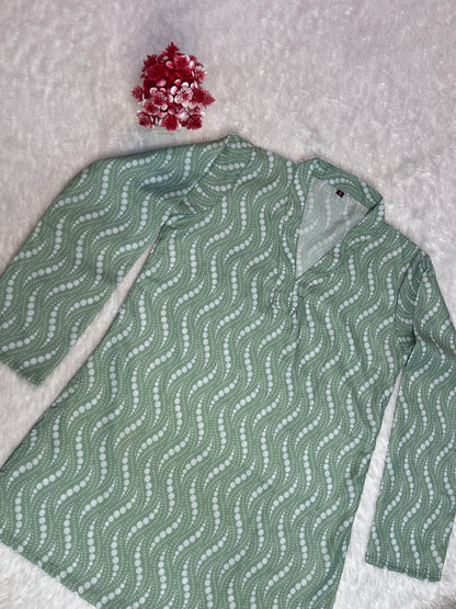 everyday wear women Tunic laid on neutral background