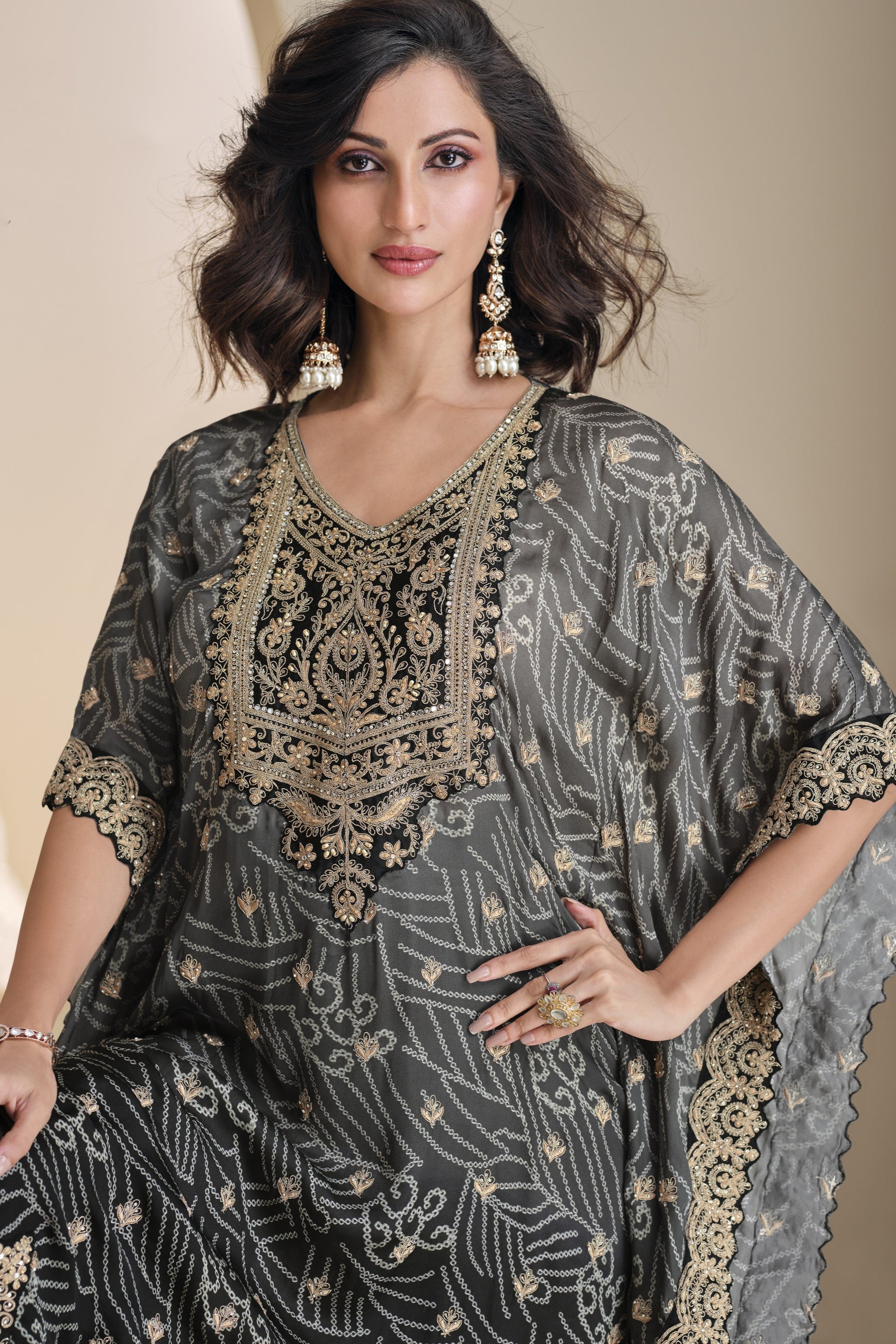 elegant black salwar suit styled for wedding guest look