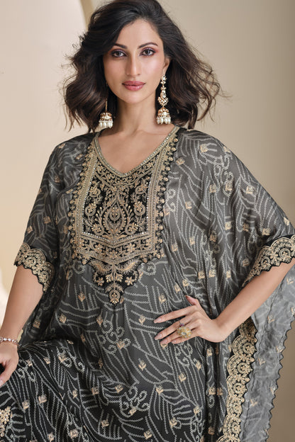 elegant black salwar suit styled for wedding guest look