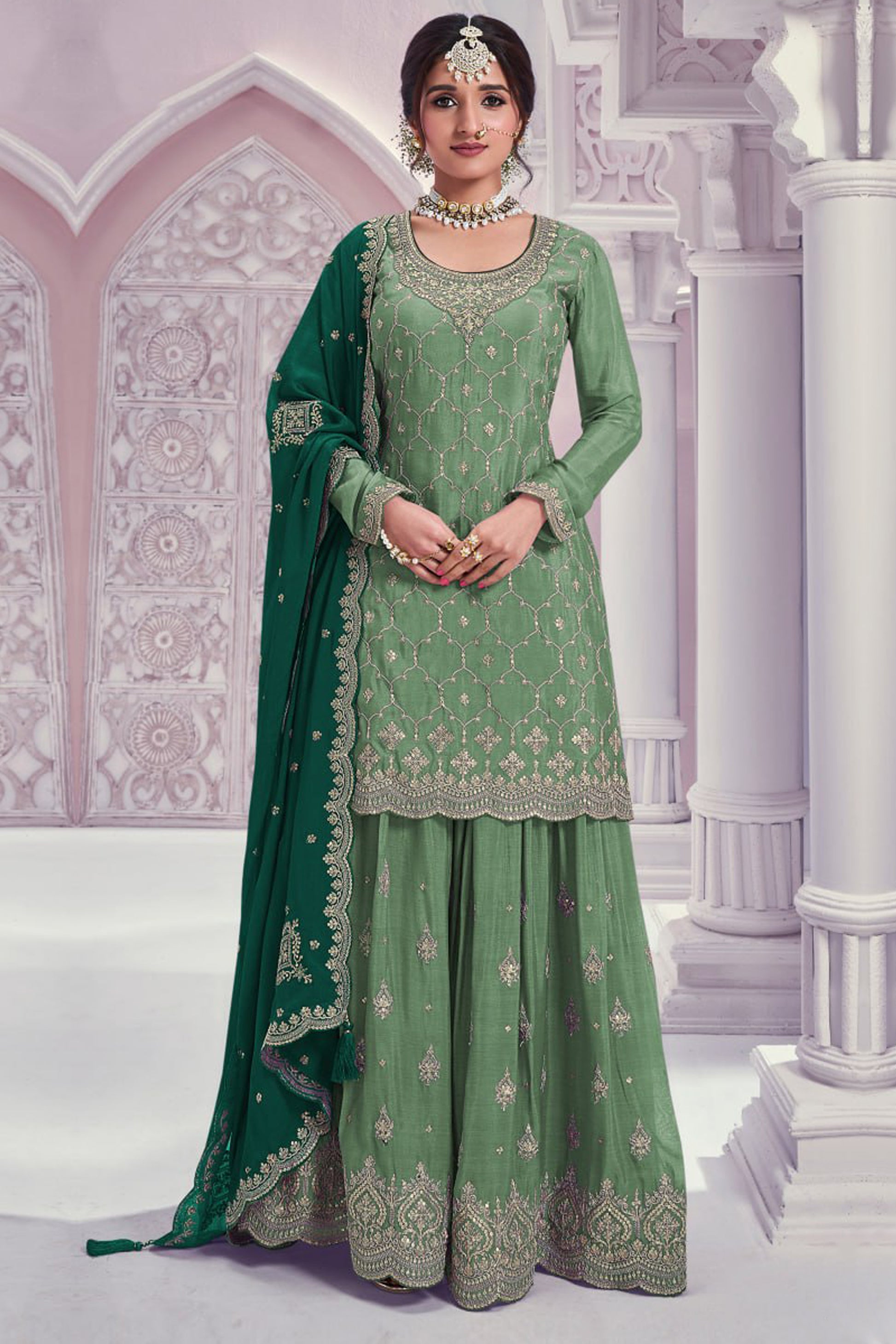 Front view of light green salwar kameez plazzo suit with embroidery work