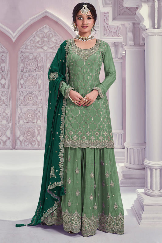 Front view of light green salwar kameez plazzo suit with embroidery work
