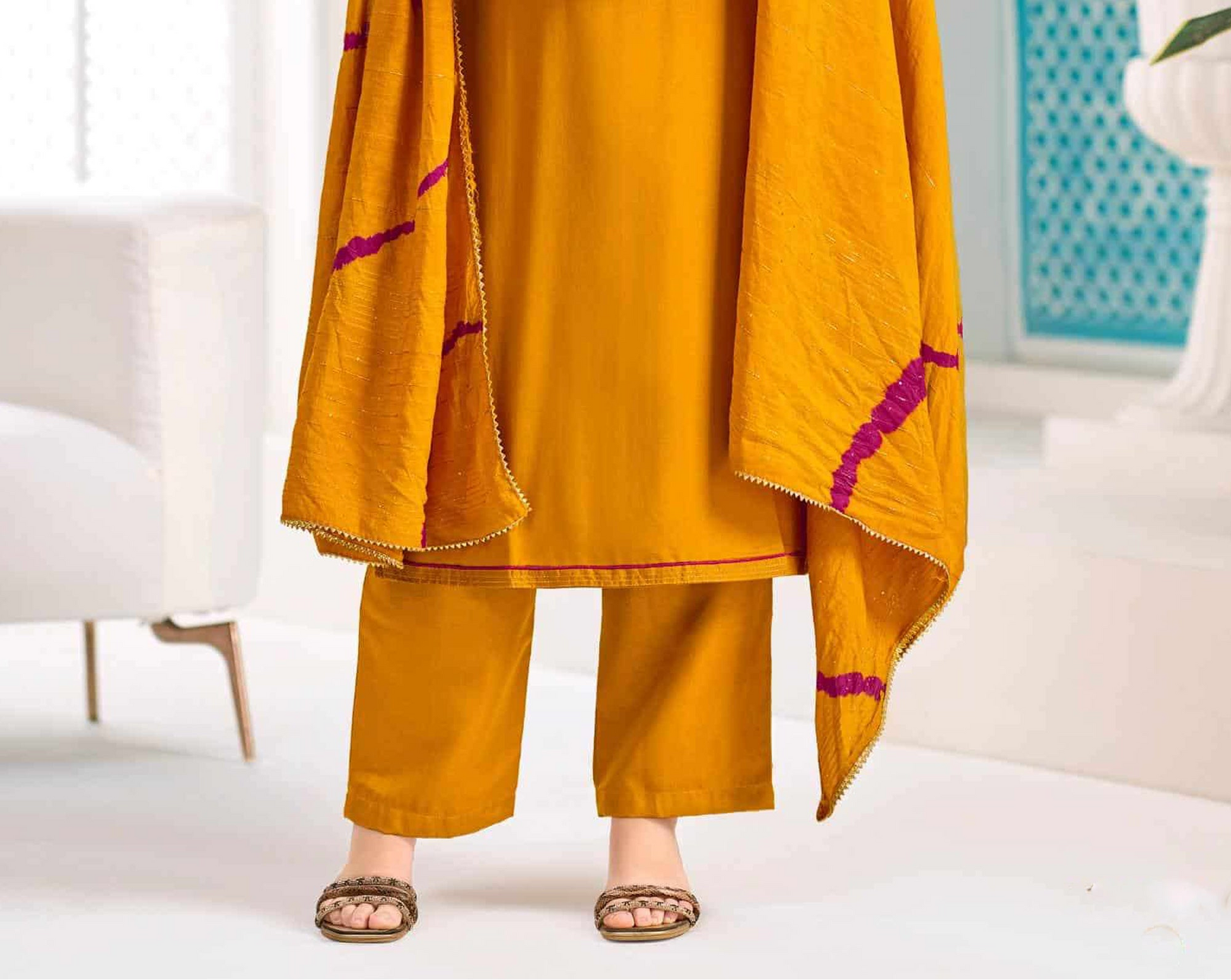 Viscose salwar kameez with embroidery work in mustard yellow