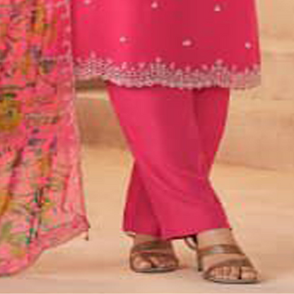Bright pink silk salwar suit for festive evening event