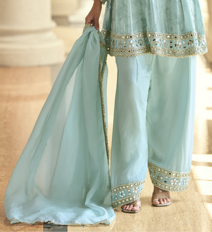 Fabric texture of premium silk mint green kameez