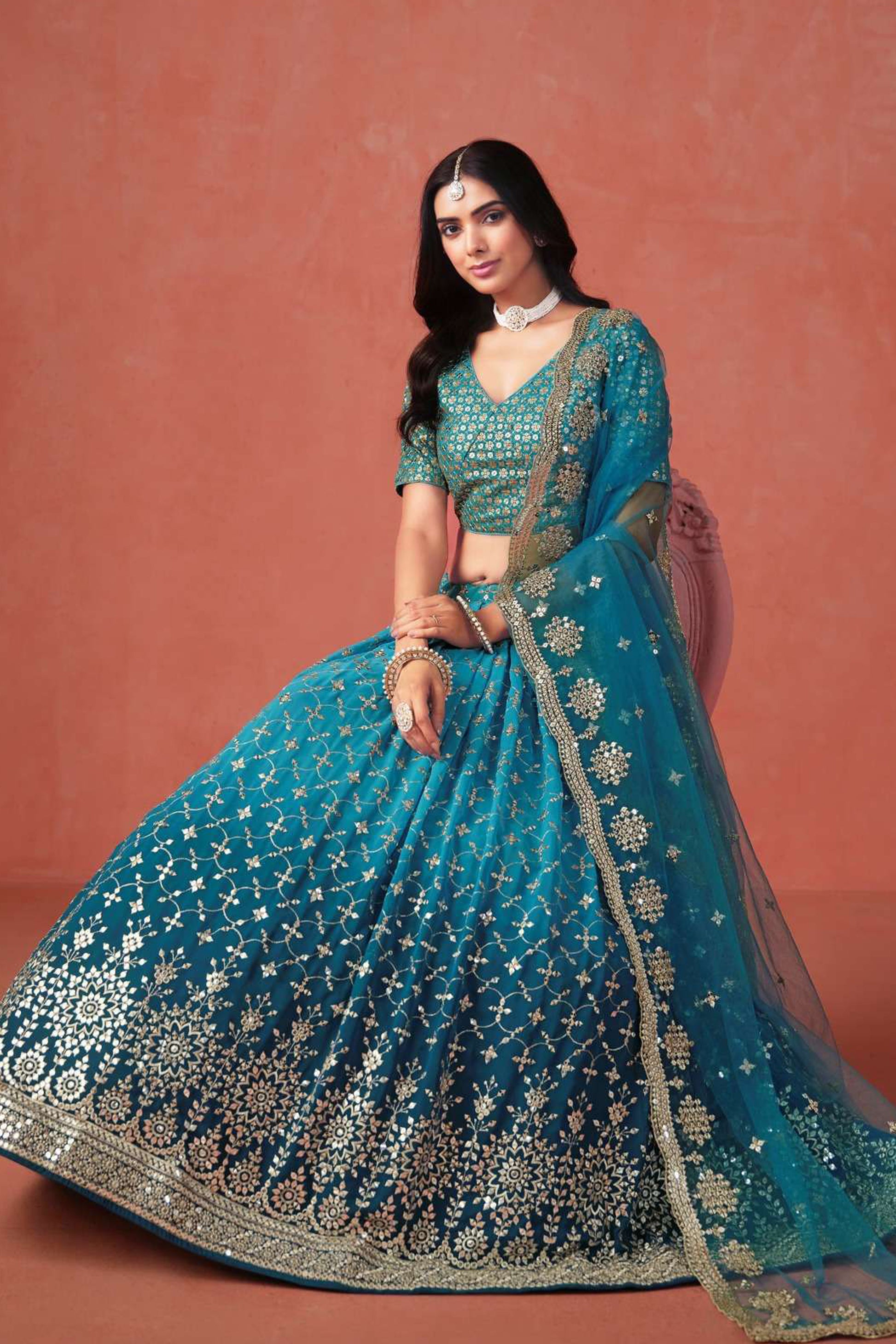 Elegant evening party look in blue lehenga choli