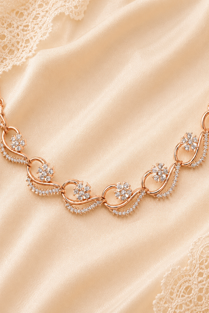 Floral necklace set styled with soft neutral knitwear