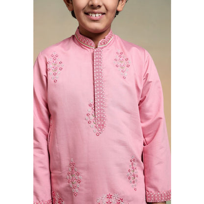 close up of multicolor thread and sequin embroidery on kurta