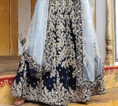 Silk and satin lehenga choli with detailed embroidery surface