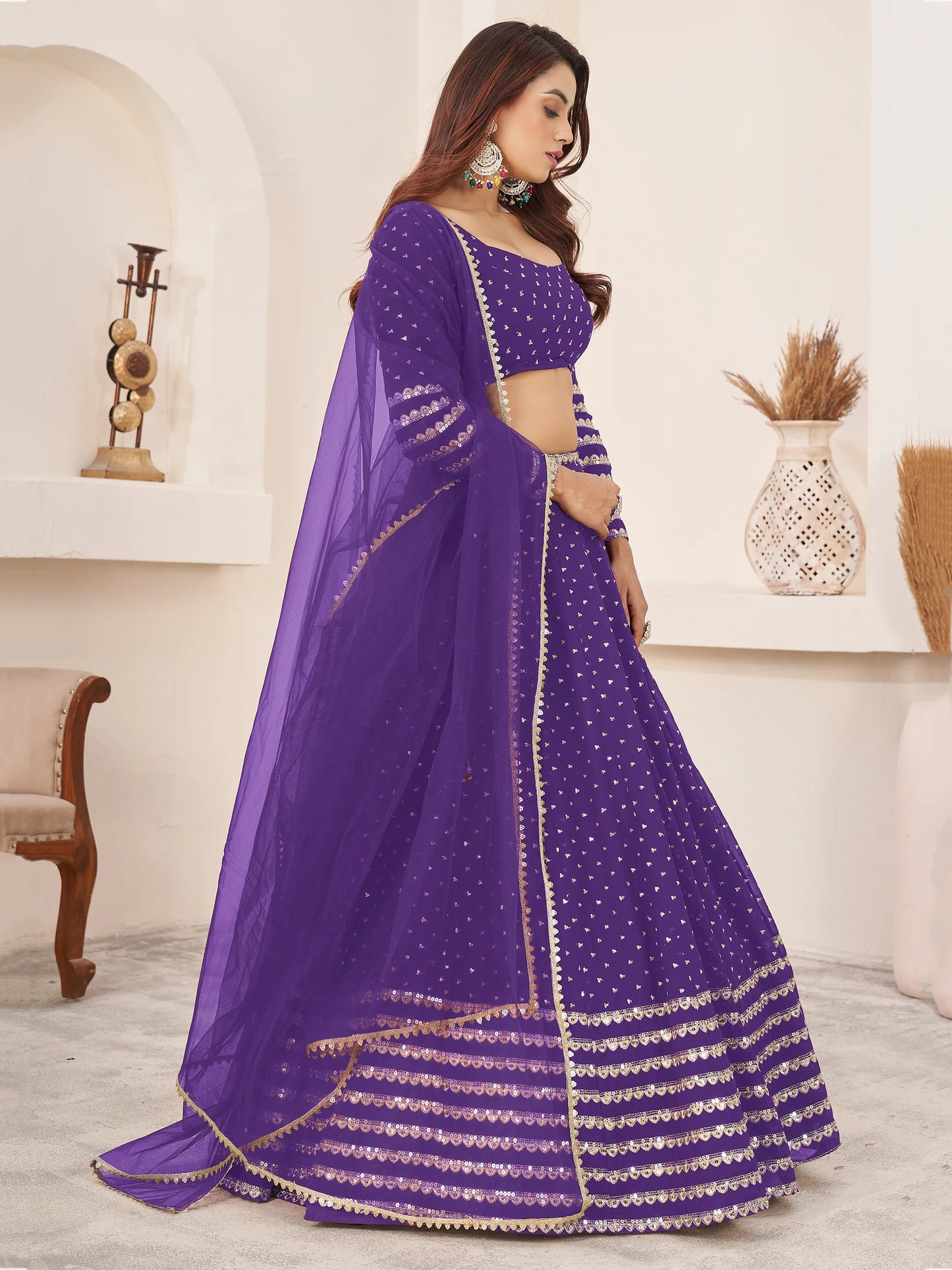 Zari work detailing on georgette lehenga fabric
