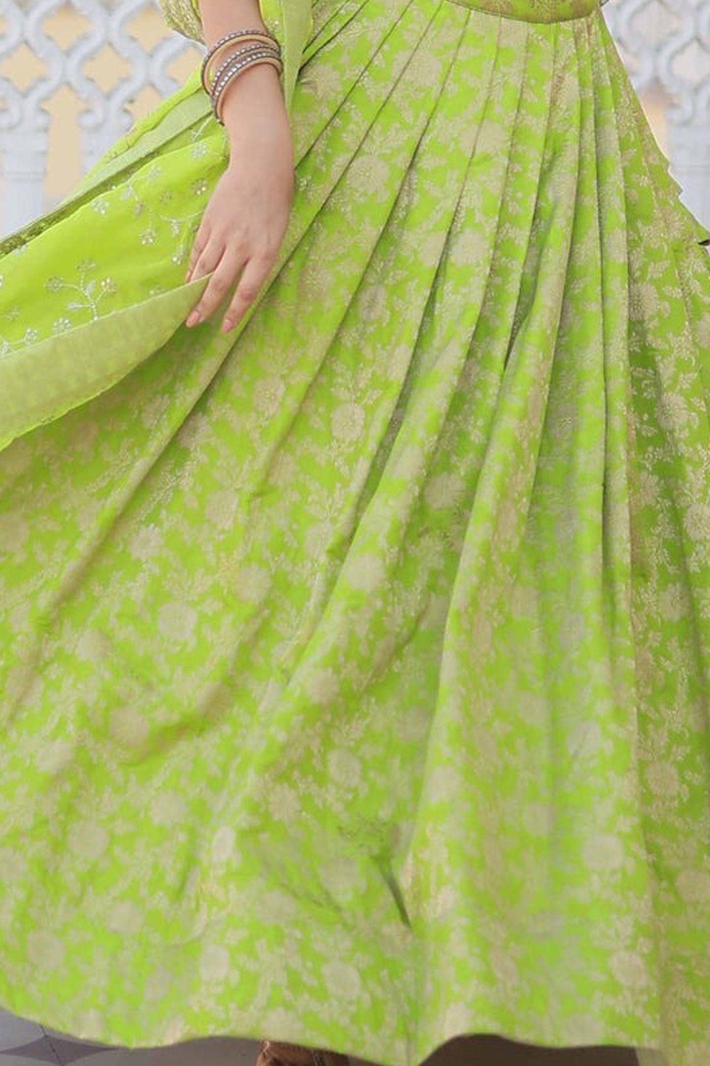 green lehenga back design with detailed work