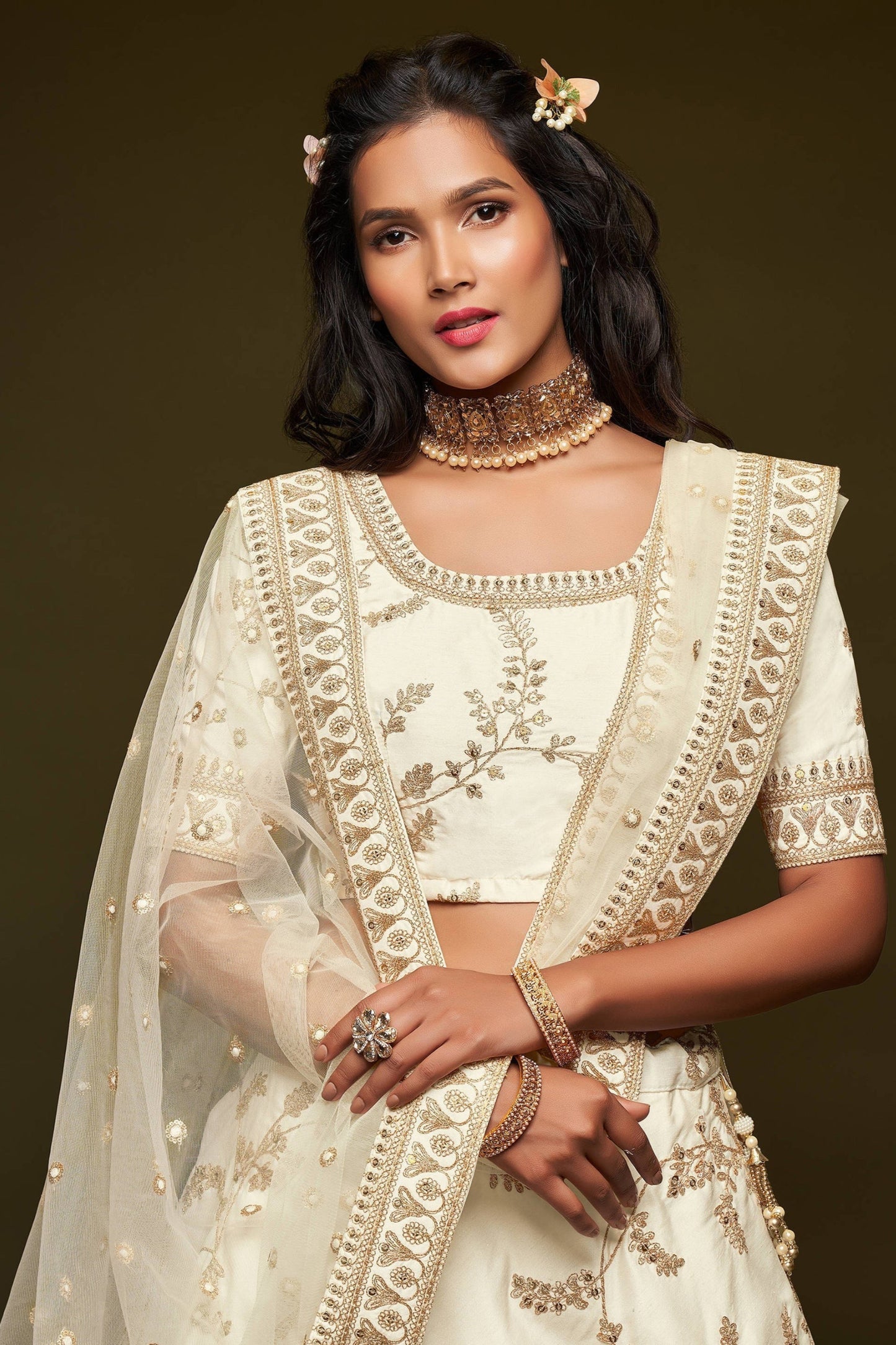 White lehenga choli with sequins and thread embroidery front view