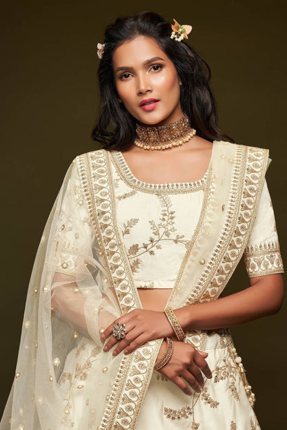 White lehenga choli with sequins and thread embroidery front view
