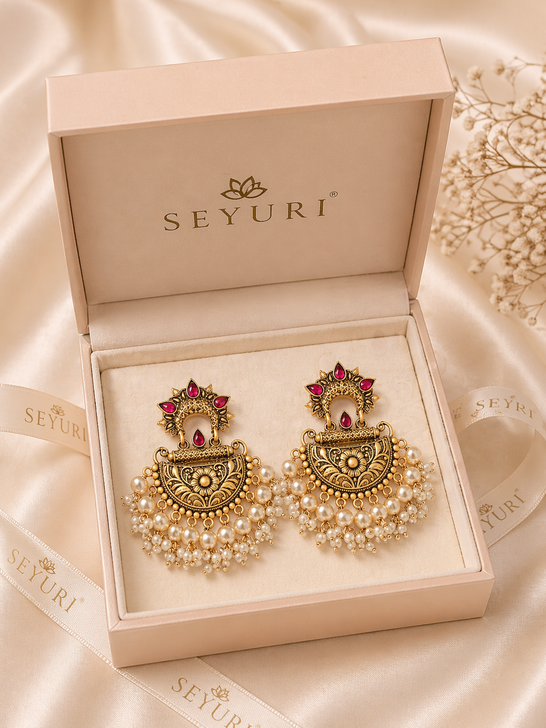 antique gold pearl chandbali earrings in box
