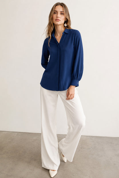 Blue solid Polyester shirt shown in a full outfit view