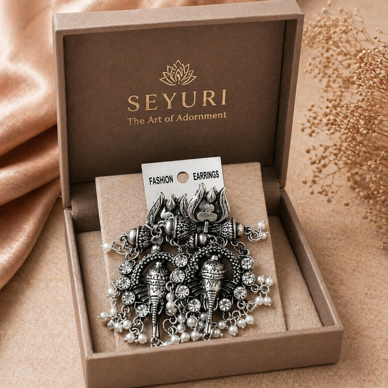 festival wear silver earrings with intricate detailing
