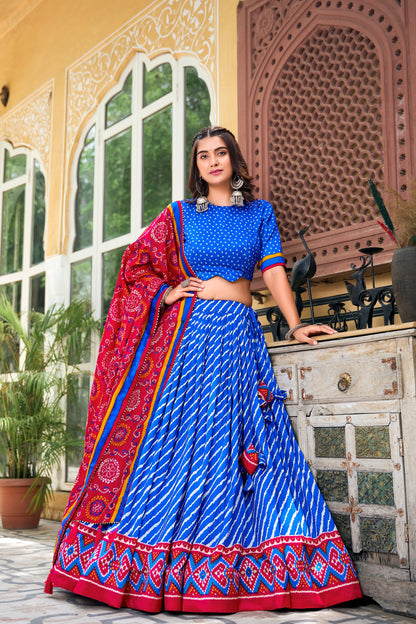 Artistic patola print detailing on blue silk lehenga