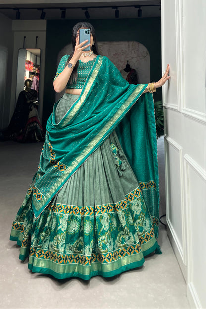 Full outfit look of lehenga in green color for festive wear