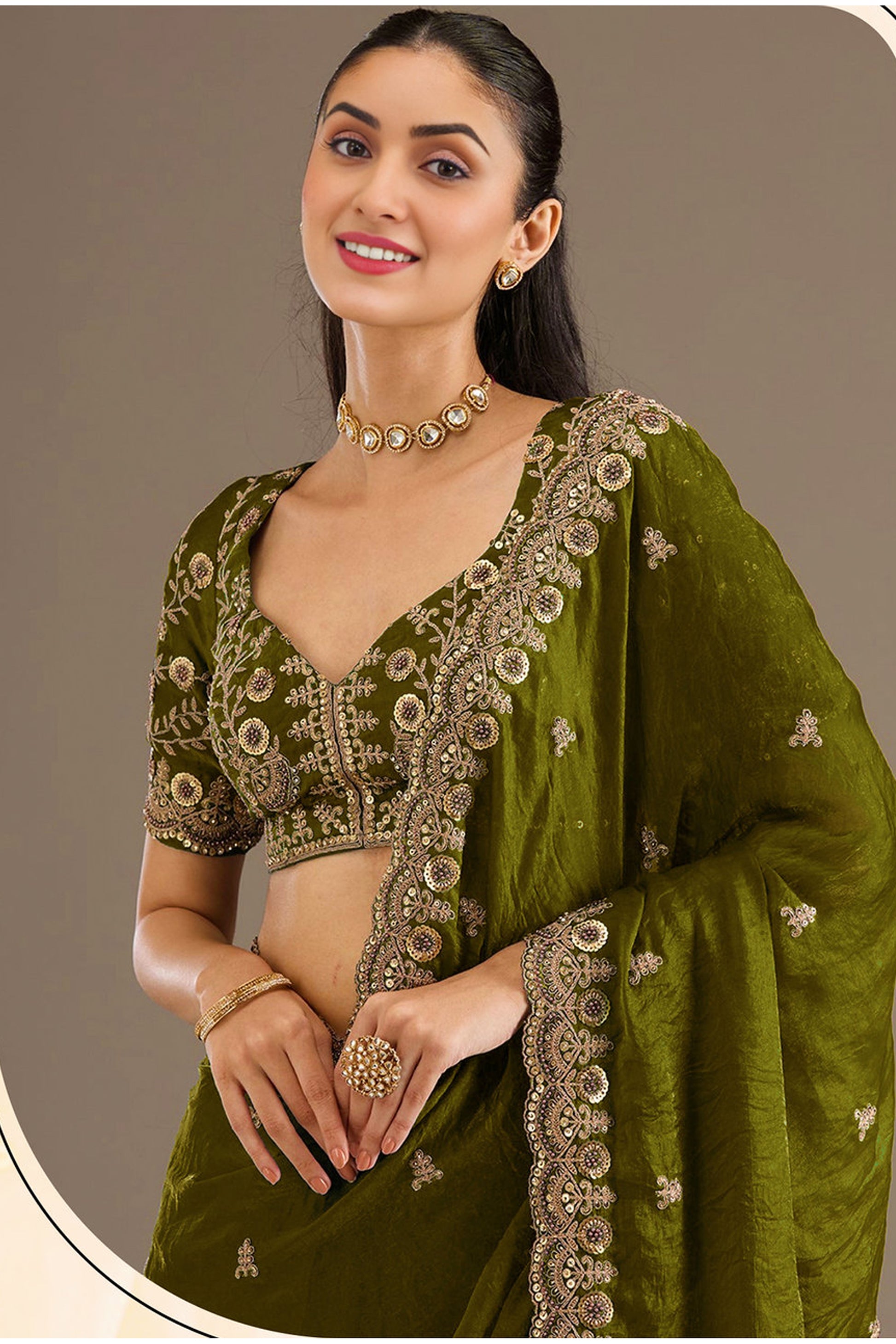 Silk saree drape with zari and embroidery texture