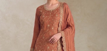 Embroidery suits for ladies with heavy thread detailing