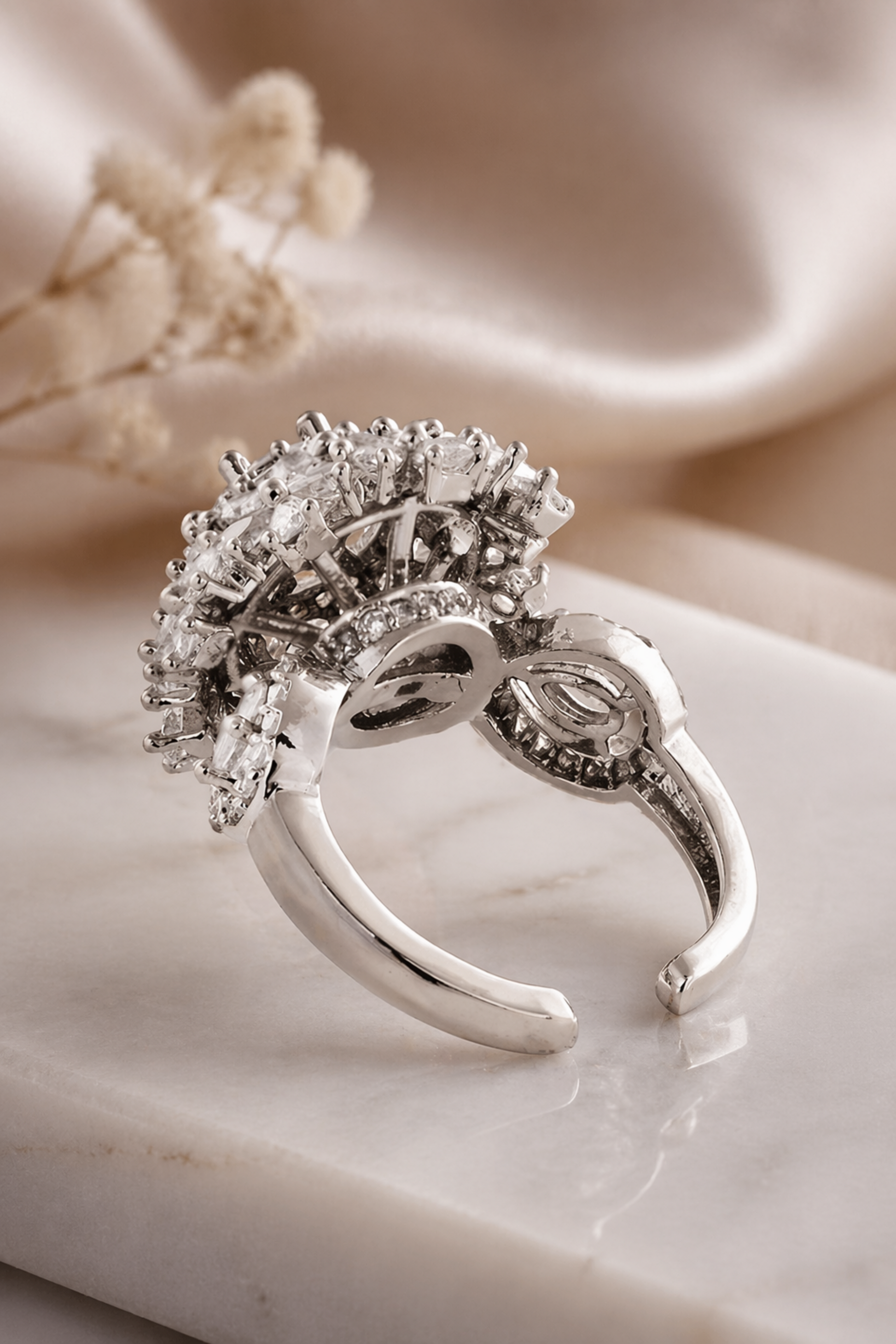 adjustable silver statement ring on hand
